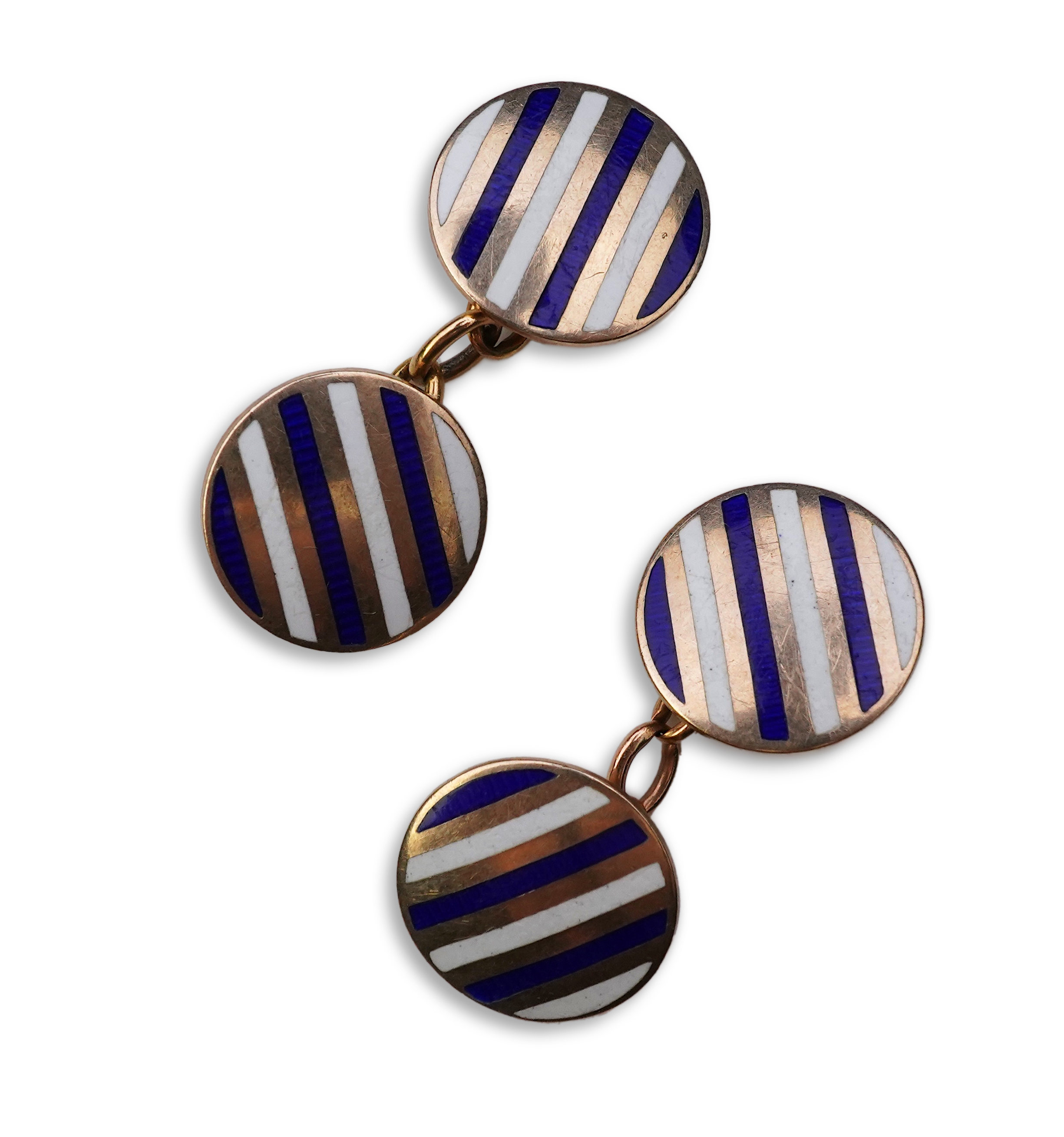 A pair of gold and enamel cufflinks